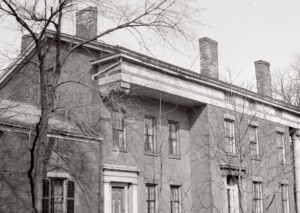 Campbell-Whittlesey house overhanging roof with cornice moulding.