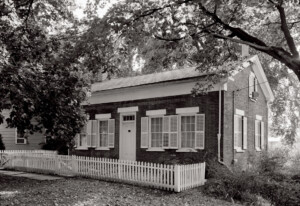 Birthplace of Thomas Edison which features picket fence and windows with shutters.