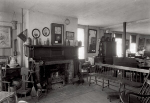 Interior of Columbian House showcasing fireplace mantel featuring mantel mouldings, and mantel panel molds.