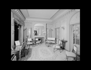 Interior of room with italian renaissance style with cornice mouldings, door, and window mouldings.