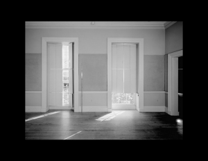 Interior of octagonal plan style room with window mouldings, and cornice mouldings.