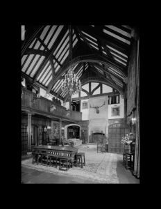 Interior of home featuring tudor style ceiling mouldings, and cabinetry mouldings.