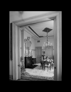 Interior of Victorian style room with door mouldings, and cornice mouldings.