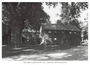 Exterior of Benjamin Abbott Farmhouse featuring shingle roofing, plaster on chimney, door casing mouldings, and window casing mouldings.
