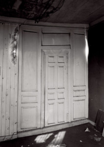 Interior of BENJAMIN PICKMAN HOUSE doorway featuring panel molds, and interior cornice.