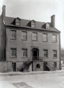 Photo from the south entrance of the Davenport House along East State Street. Brick Exterior, two floors with a livable attic floor and basement.