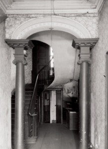 Hall archway of Davenport House with beautiful architrave details, columns and ceiling details on the first floor hallway.